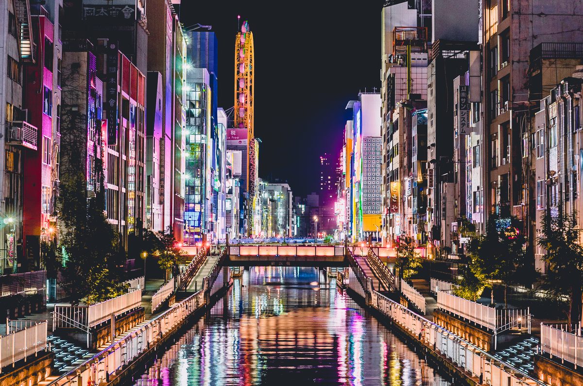 Neon signs reflected in the Dotonbori canal, Osaka, at night
